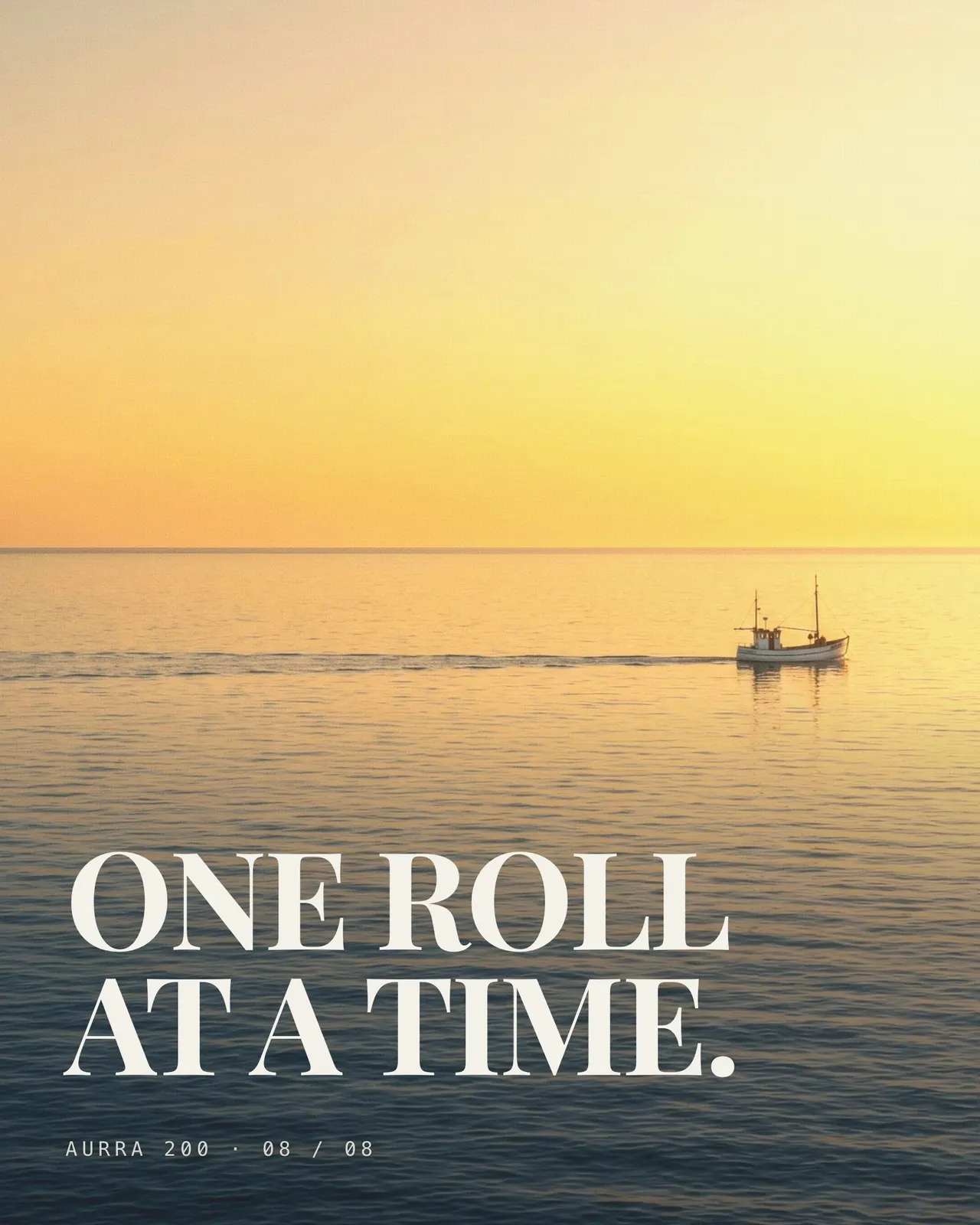 เรือประมงลำเล็กแล่นบนผิวน้ำตอนพระอาทิตย์ตก มีตัวอักษร ONE ROLL AT A TIME ทับครึ่งล่าง