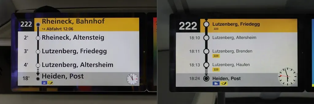 จอแสดงเวลารถโดยสาร PostAuto ในสวิตเซอร์แลนด์ ตัวหนังสือดำบนพื้นขาวและแถบเหลือง