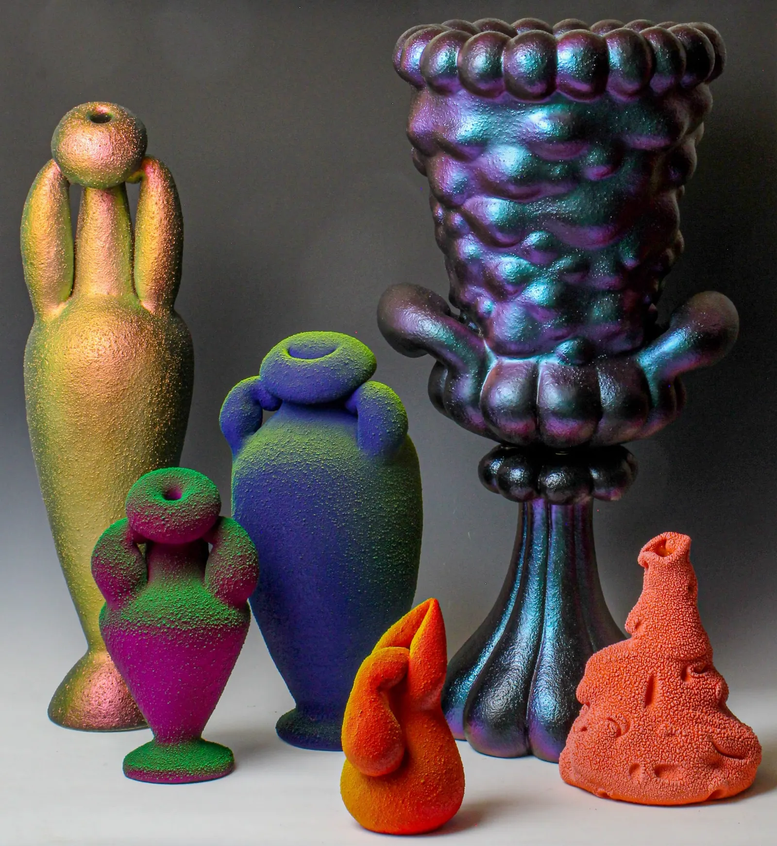 Maxwell Mustardo - Collection of fluorescent ceramic vessels