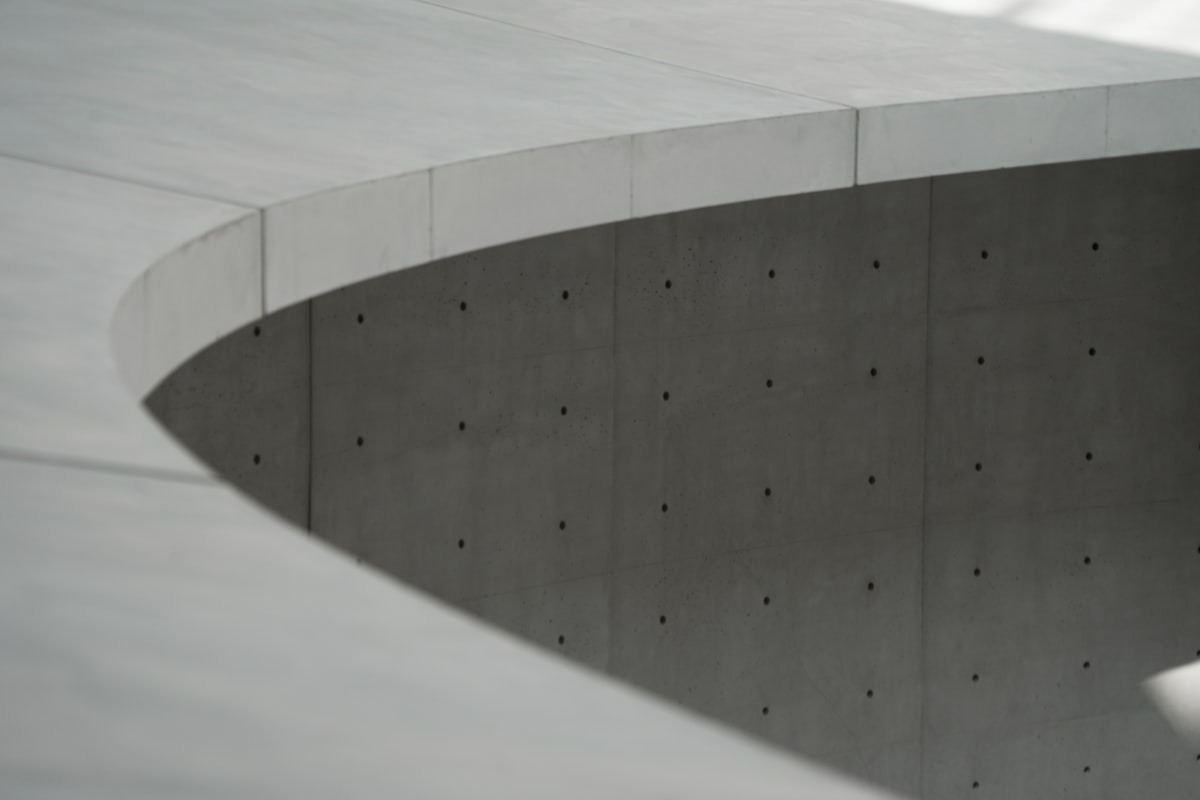 Curved concrete building exterior architecture