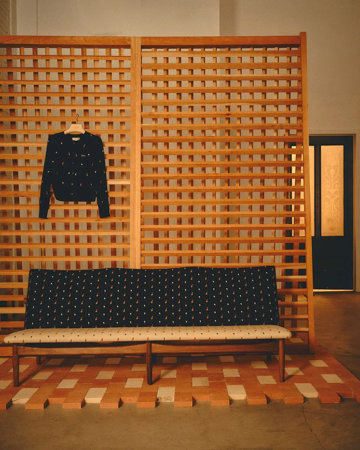 Detail of Flower Embroidery textile on Finn Juhl Japan Series furniture