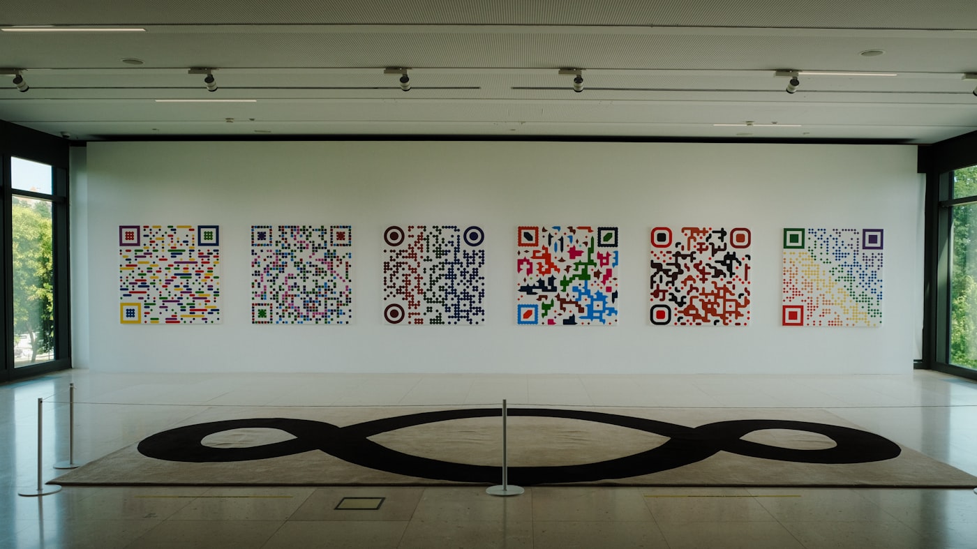 Contemporary art gallery with paintings on display